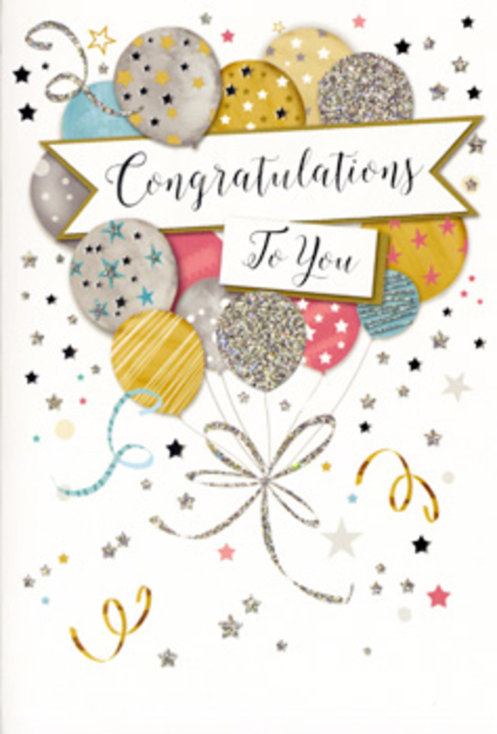 The congratulations card pictured here is a carefully composed scene of joyous celebration, illustrated with the same attention to detail a florist near Parsons Green would use to build a showpiece bouquet. Dominating the design is a generous cluster of balloons floating from the lower half of the card toward the upper edge, painted in soft metallic tones of gold, silver, champagne, muted sky blue, and blush pink. The balloons overlap in a natural, organic way, creating depth and the impression that they are gently crowding together, as though just released in a cosy gathering off Fulham Road. Subtle patterns distinguish each balloon: some are embellished with glistening starbursts, others with slender glittering stripes, and a few with scattered, sparkling dots that mimic confetti. The artist has suggested the shine and texture of metallic ink, so certain highlights appear to glimmer even in stillness, like sunlight catching on a shop window display. From the base of the balloons, fine ribbons curl downward and outward in loops of gold and silver, their sinuous lines echoing the elegant trails of cascading foliage in a professionally arranged bouquet. Around the main composition, tiny metallic stars, filigree swirls, and flecks of confetti scatter across a soft, neutral background, lending the entire card an atmosphere of movement and light-hearted festivity. A graceful banner arches across the centre, bordered with an understated shimmer and carrying the message "Congratulations To You" written in stylish, flowing script that feels both celebratory and sincere. The overall impression is one of refined joy-a card beautifully suited to accompany flowers for graduations, promotions, or new beginnings delivered throughout Parsons Green and the surrounding Fulham area.